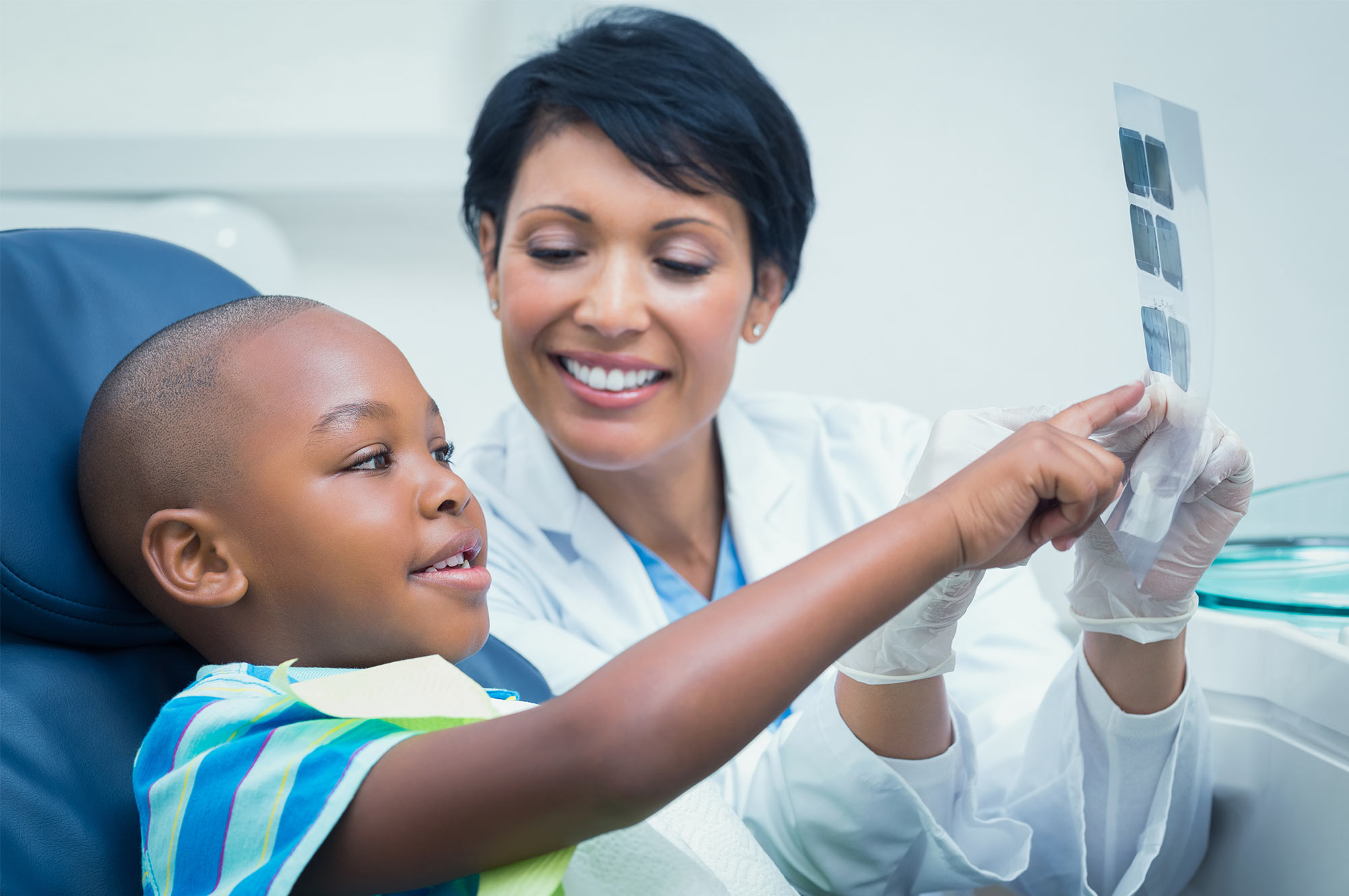 Dentist with child patient